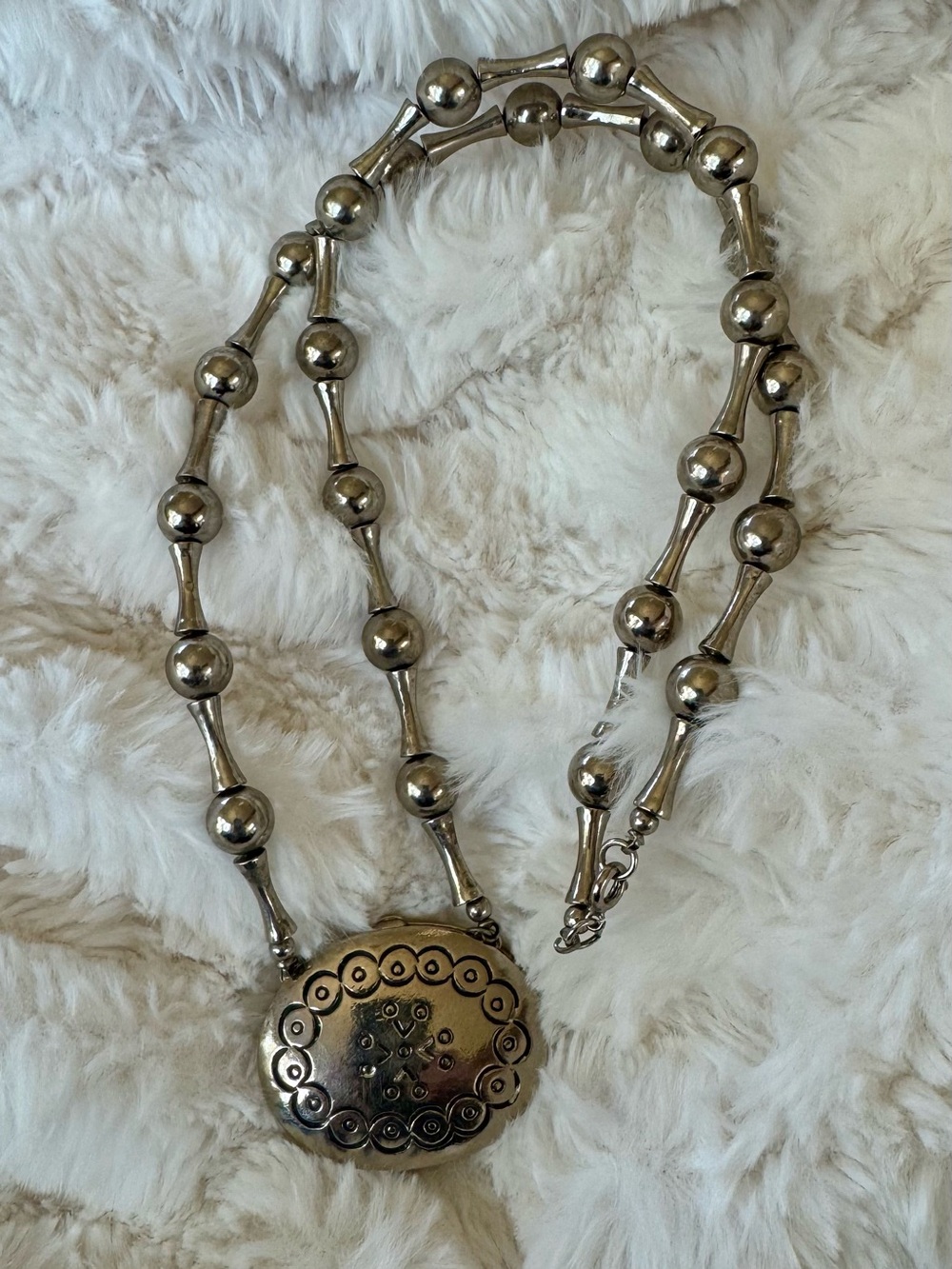 Estee Lauder Silver-Tone Beaded Necklace with Ornate Oval Pendant